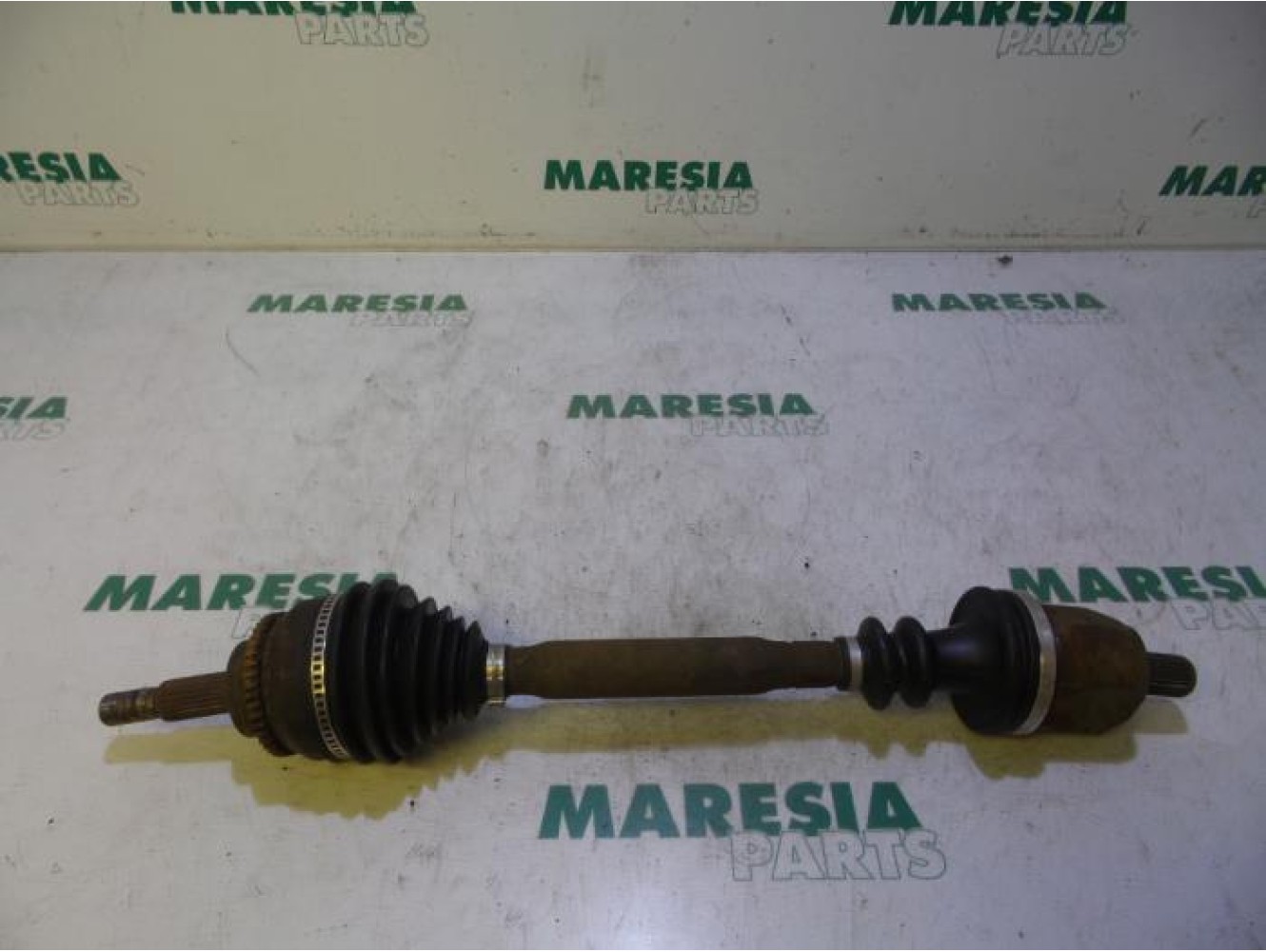 Renault - Megane Scenic - Aandrijfas links-voor