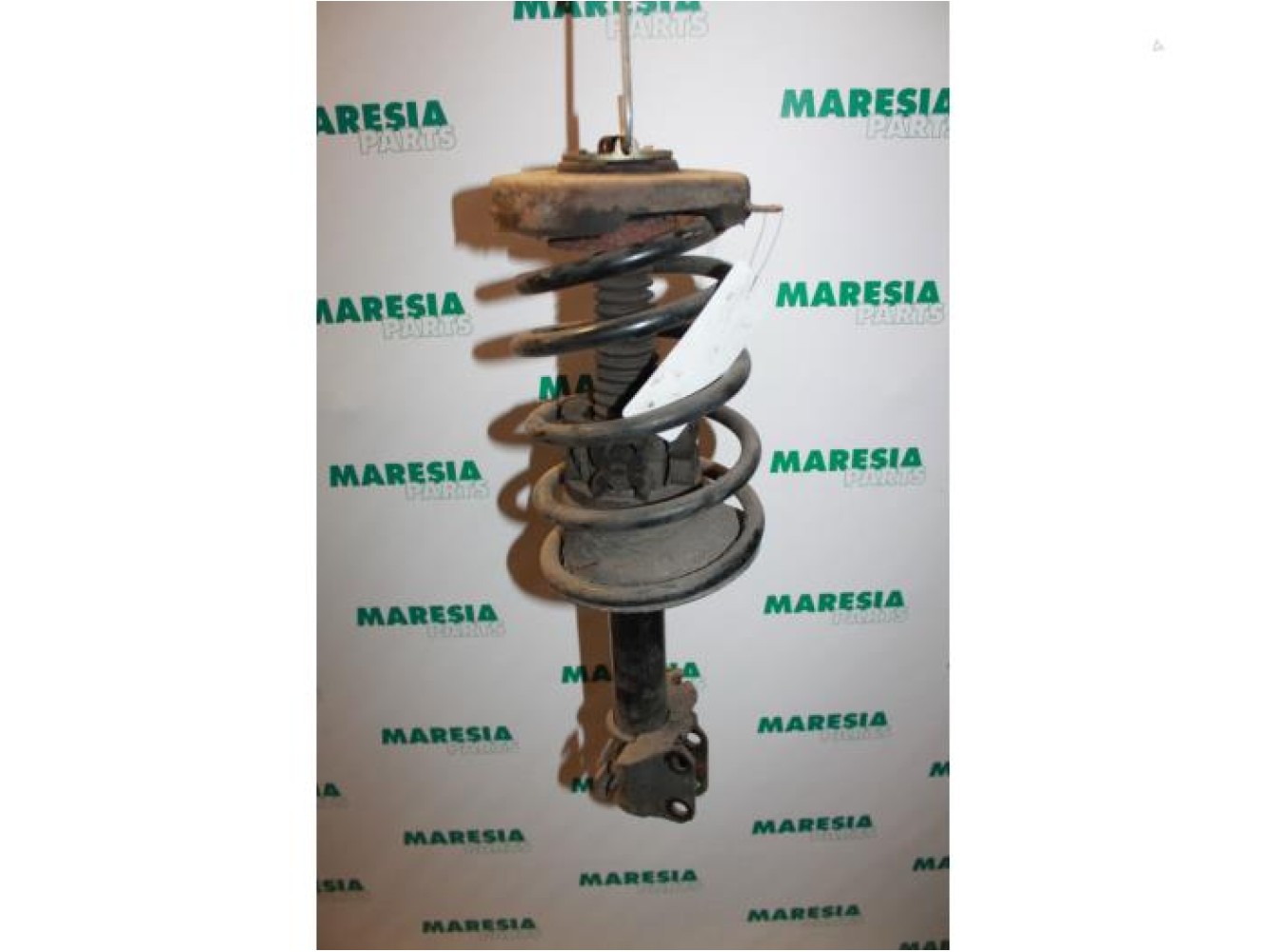 Renault - Megane - Front shock absorber rod, left