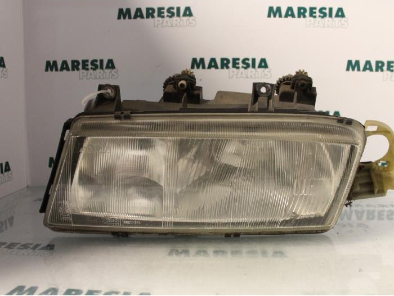 Lancia - Delta - Scheinwerfer links