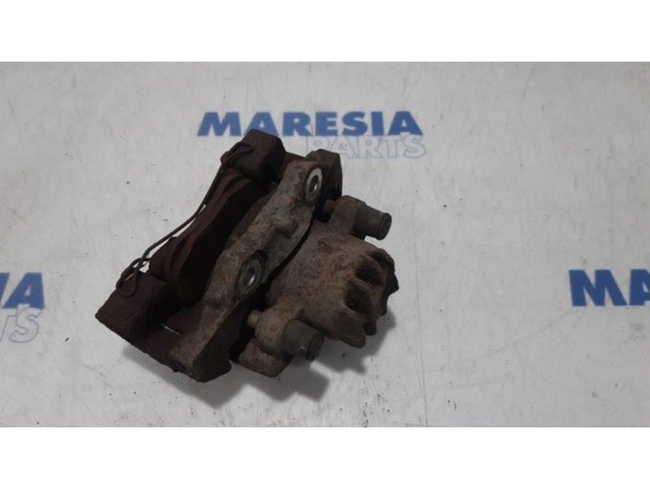 Citroen - Berlingo - Front brake calliper, left