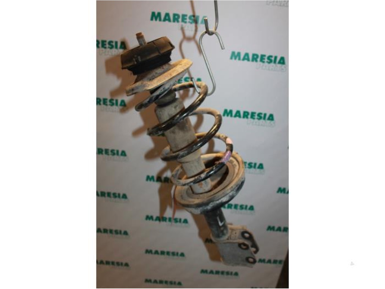 Renault - Kangoo - Front shock absorber rod, left
