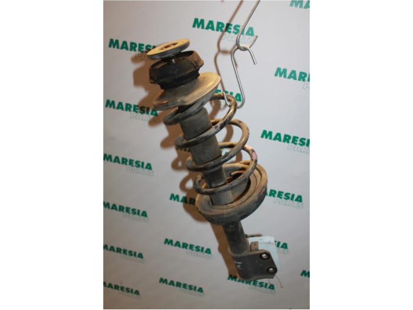 Renault - Kangoo - Front shock absorber rod, left