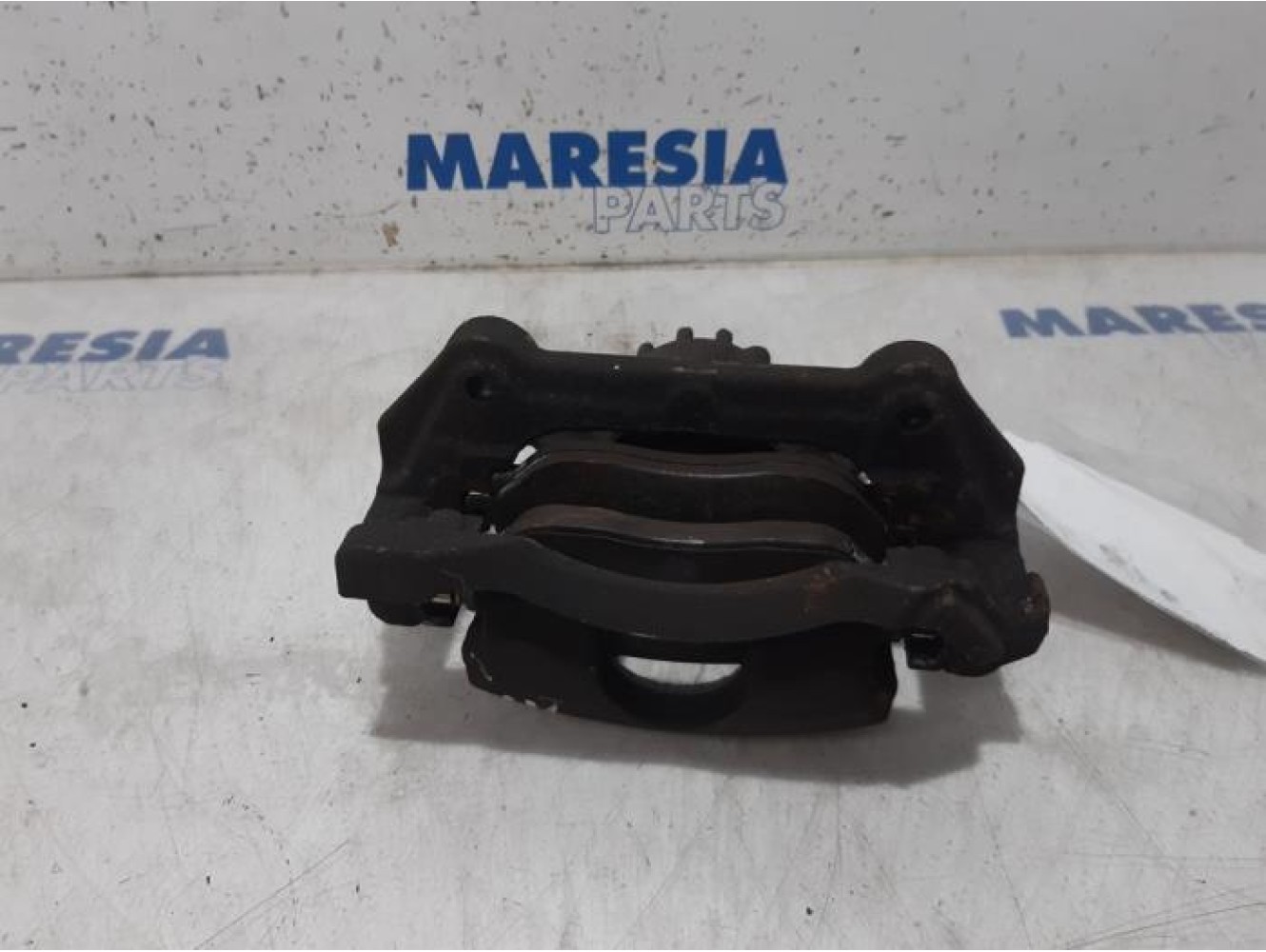 Opel - Vivaro - Front brake calliper, left