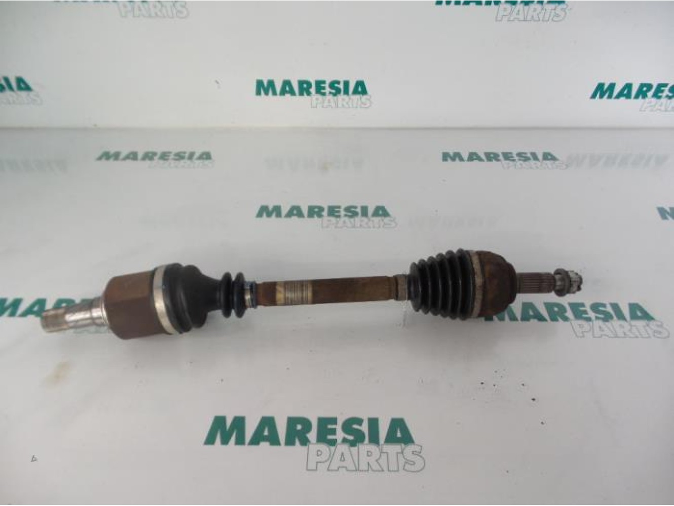 Renault - Megane - Aandrijfas links-voor