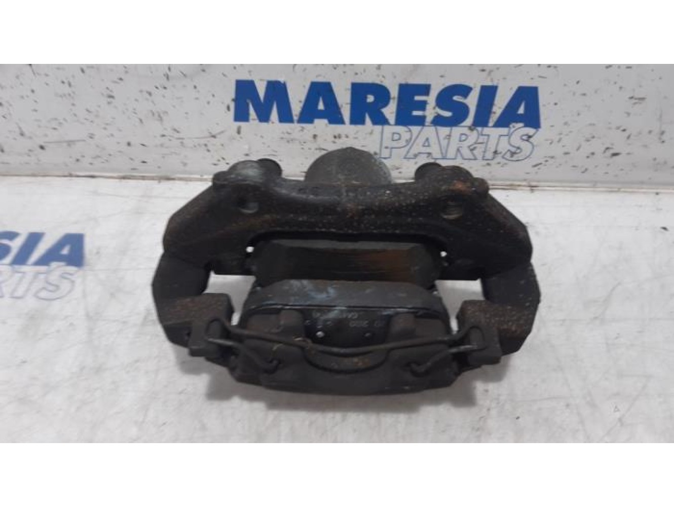 Renault - Clio - Front brake calliper, left