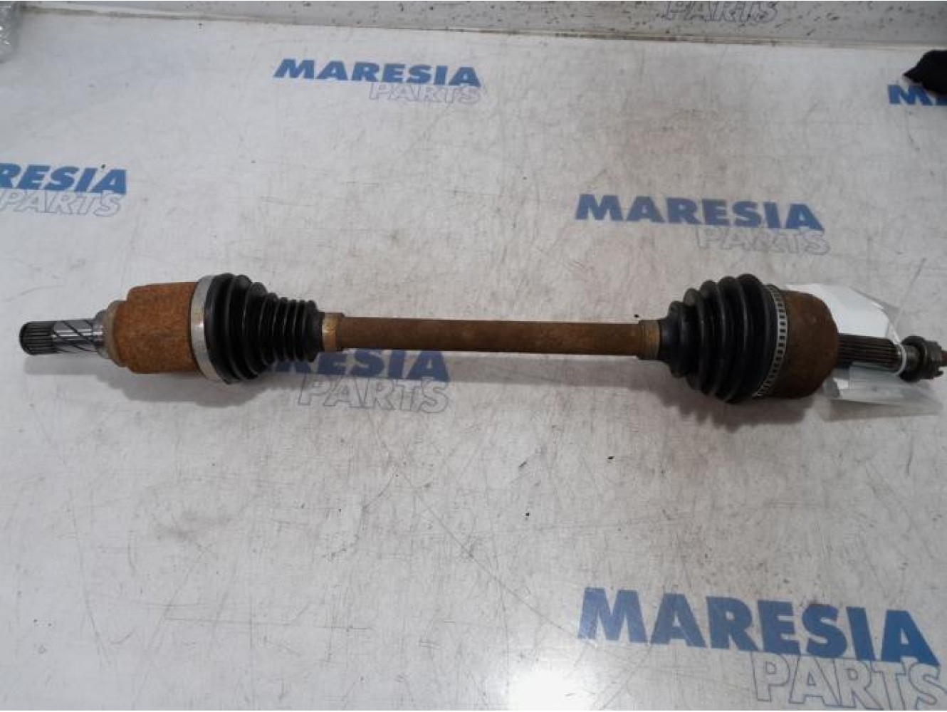 Renault - Megane - Aandrijfas links-voor