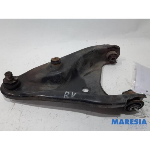 Dacia - Logan - Front lower wishbone, right