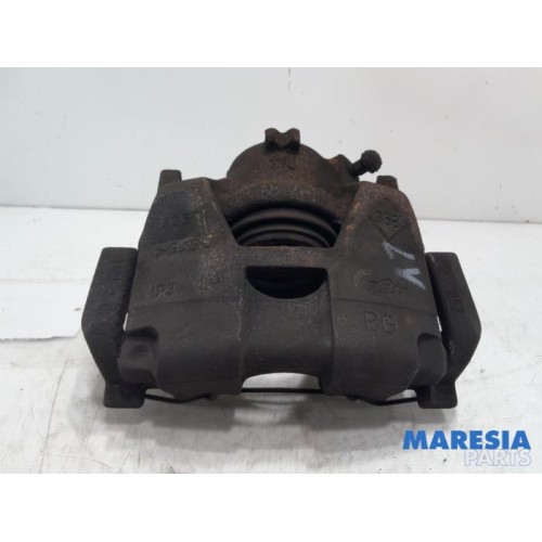 Renault - Scenic - Front brake calliper, left