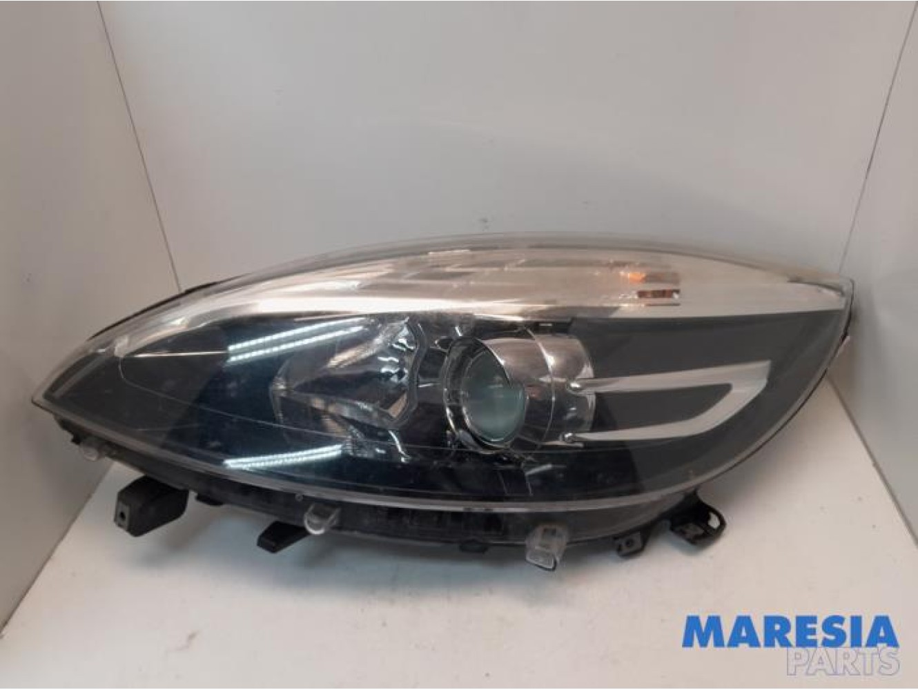 Renault - Scenic - Koplamp links