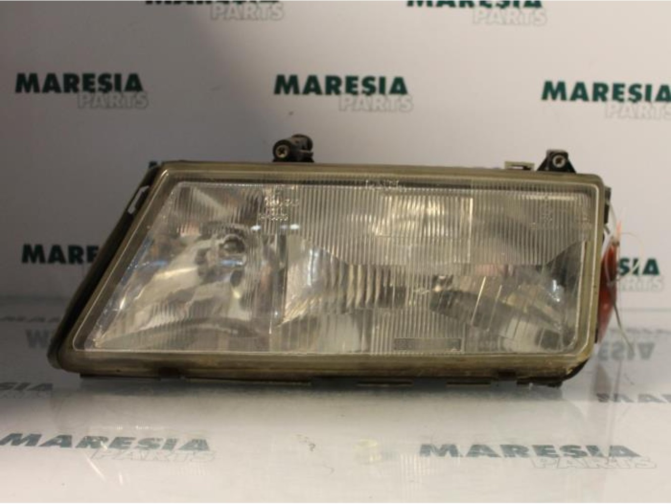 Lancia - Dedra - Koplamp links