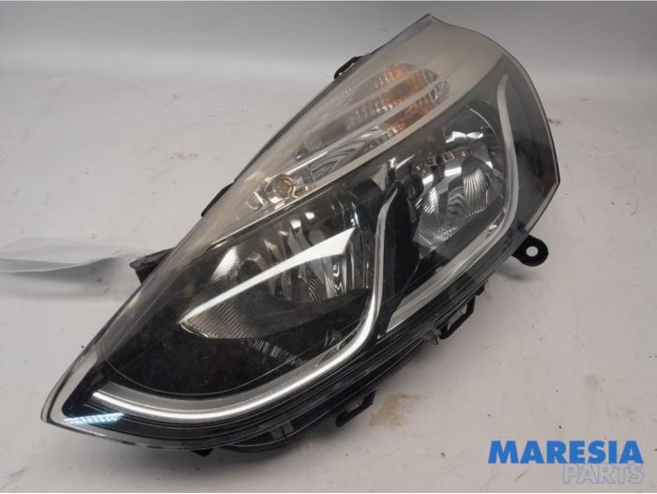 Renault - Clio - Koplamp links