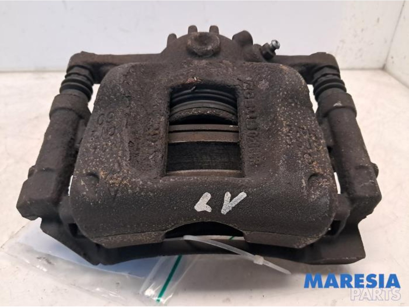 Opel - Vivaro - Front brake calliper, left