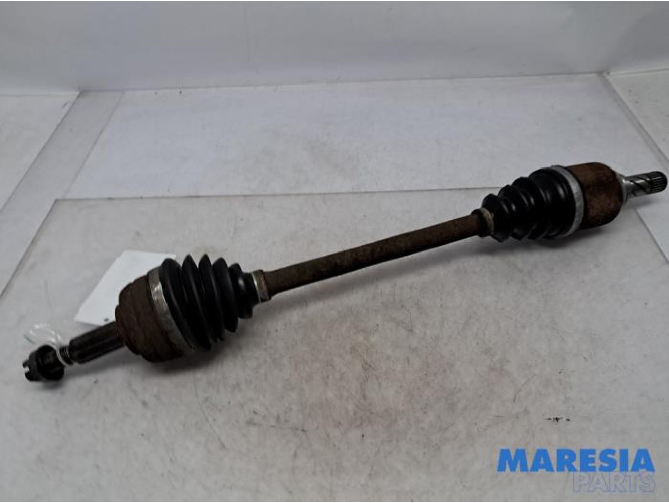Renault - Megane - Aandrijfas links-voor