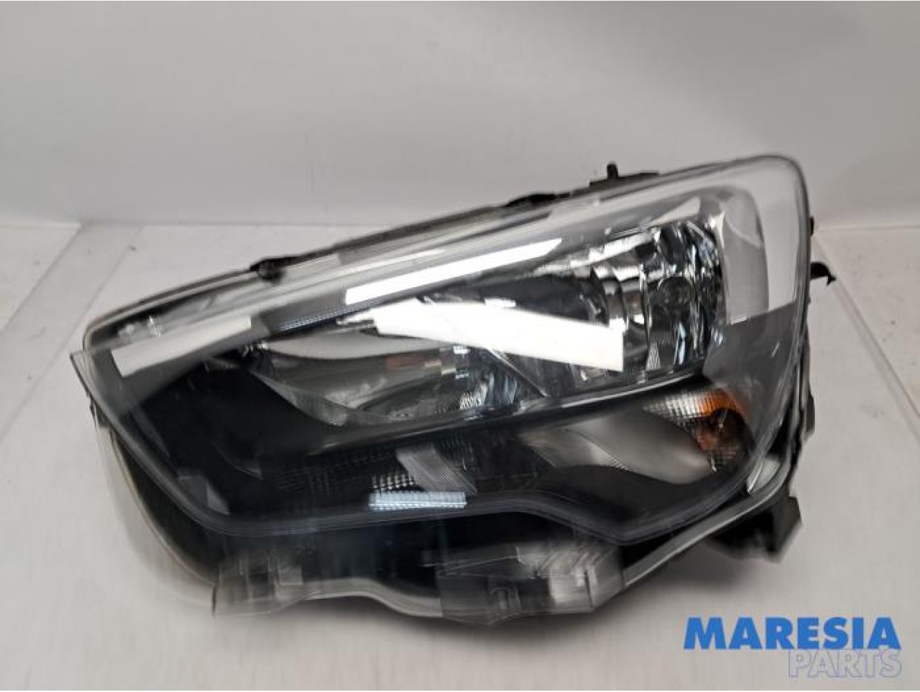 Opel - Combo - Scheinwerfer links