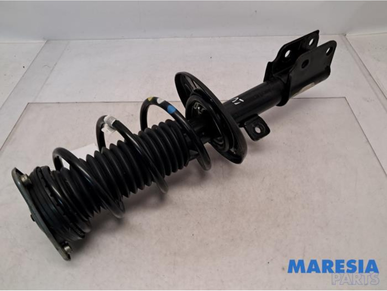 Opel - Combo - Front shock absorber rod, left
