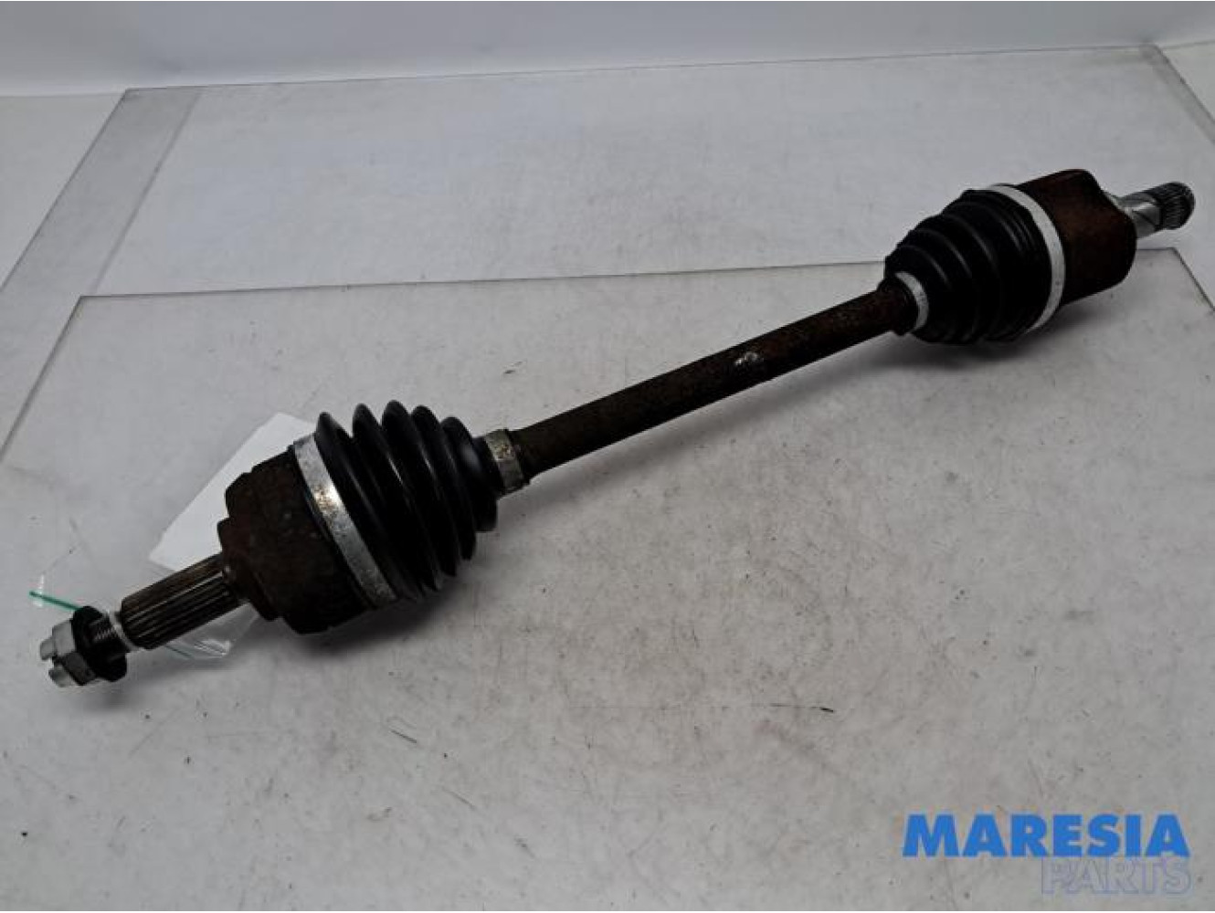 Renault - Megane - Aandrijfas links-voor