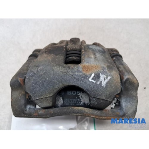 Renault - Clio - Front brake calliper, left