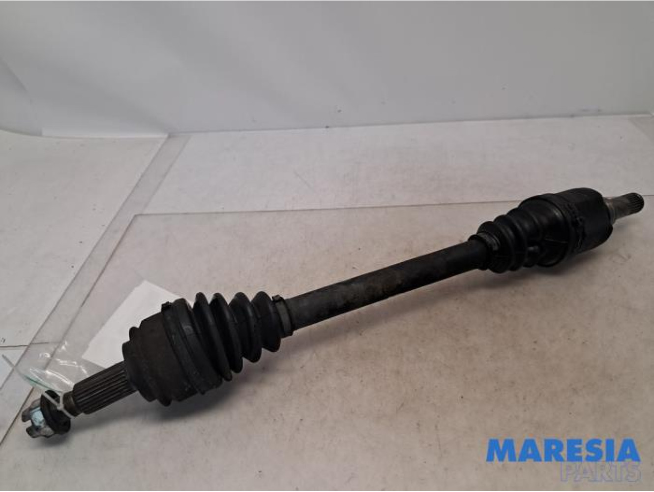 Renault - Kangoo - Aandrijfas links-voor