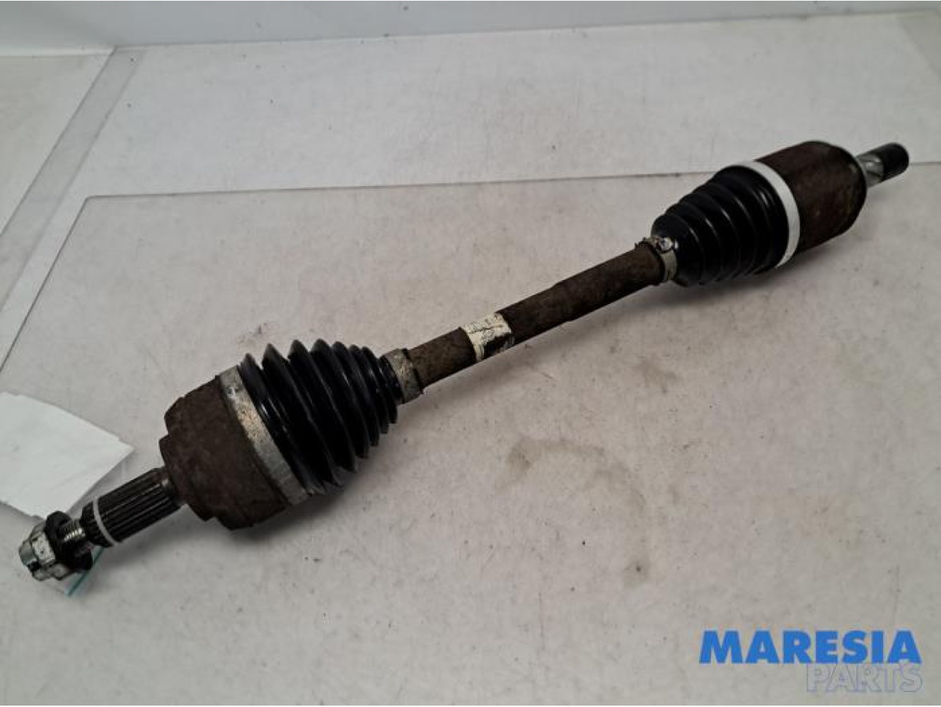 Renault - Megane - Aandrijfas links-voor