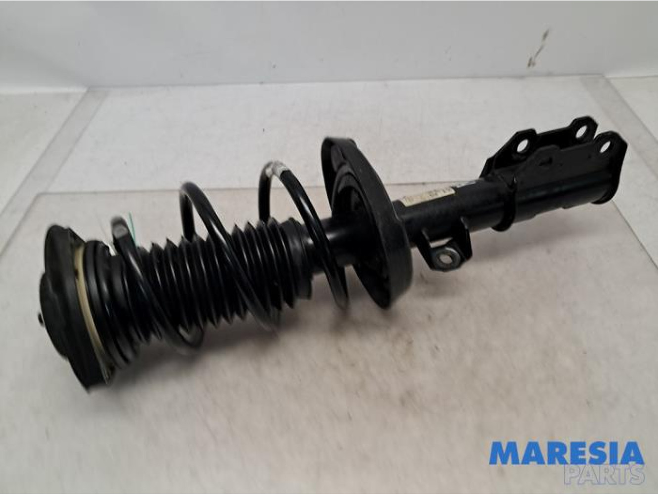 Opel - Astra - Front shock absorber rod, right