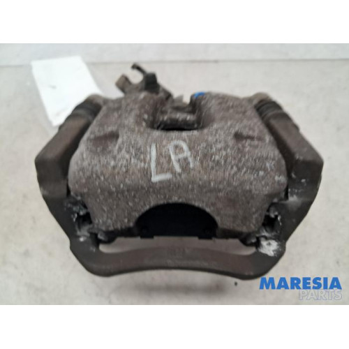 Opel - Astra - Rear brake calliper, left