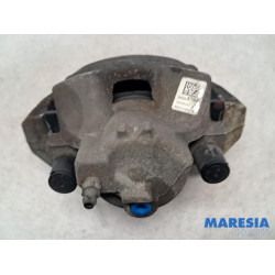 Opel - Astra - Front brake calliper, left