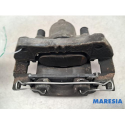 Opel - Astra - Front brake calliper, left