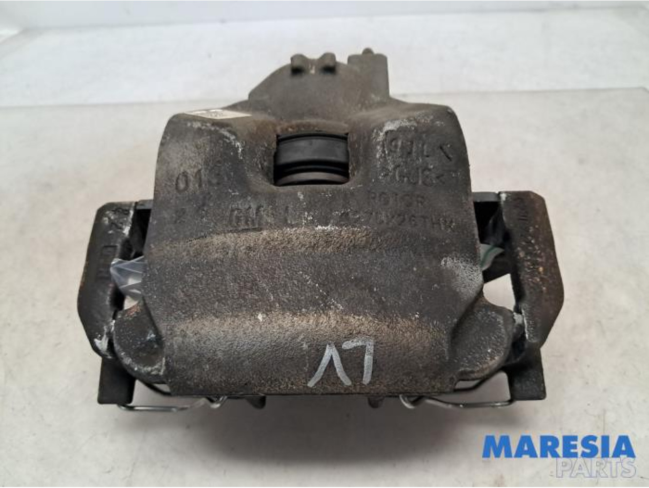 Opel - Astra - Front brake calliper, left