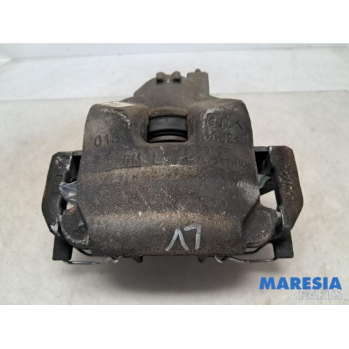 Opel - Astra - Front brake calliper, left