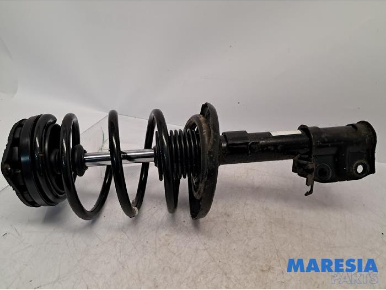 Renault - Grand Scenic - Front shock absorber rod, left