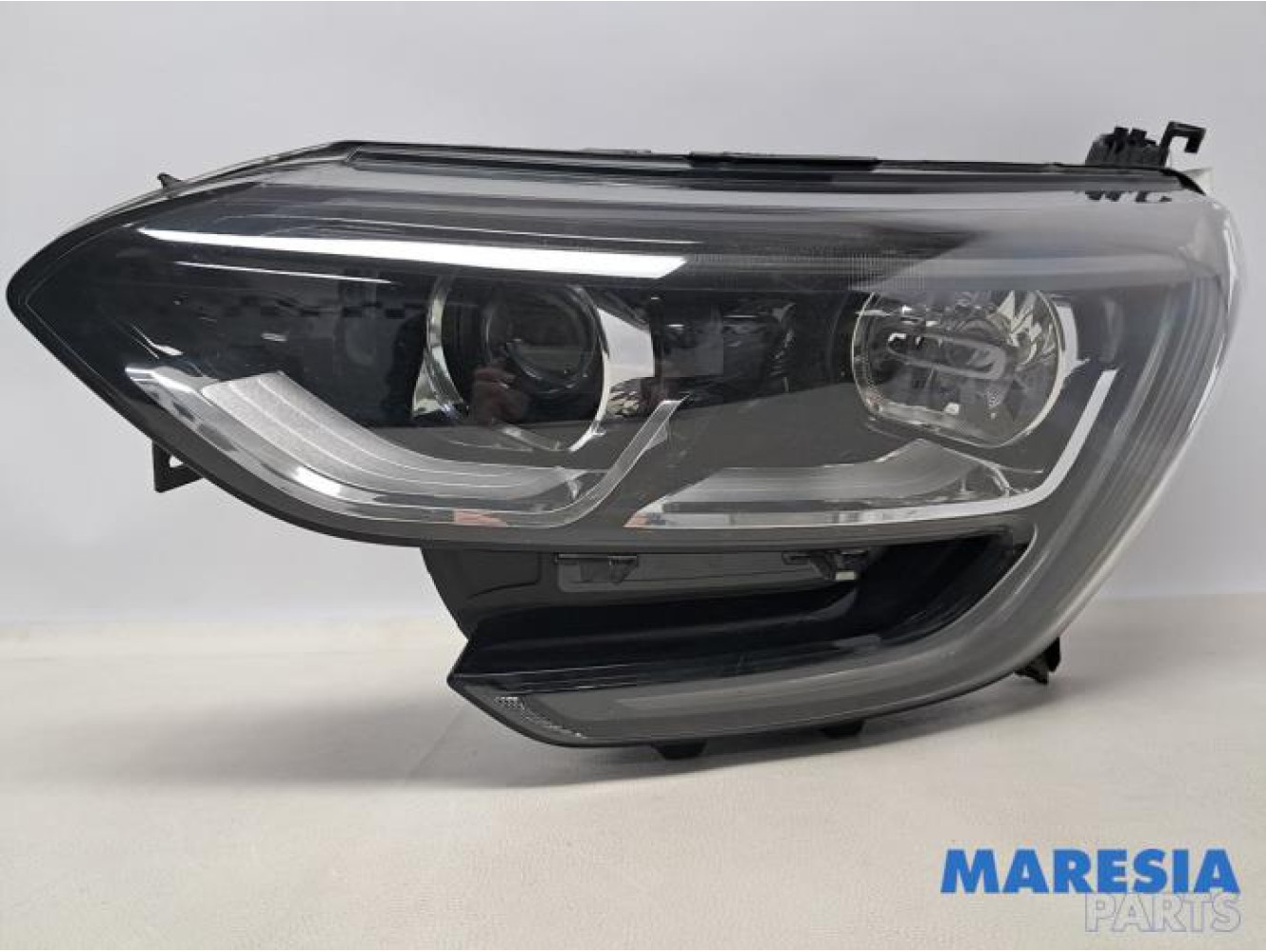 Renault - Megane - Koplamp links