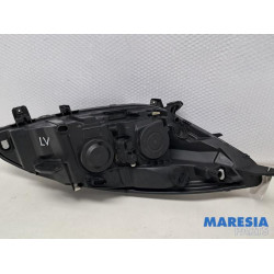 Renault - Scenic - Koplamp links