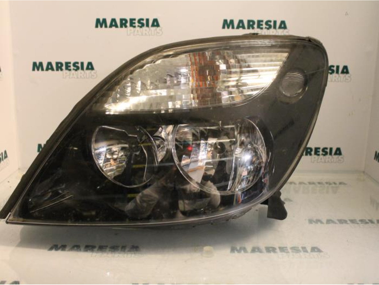 Renault - Megane Scenic - Koplamp links