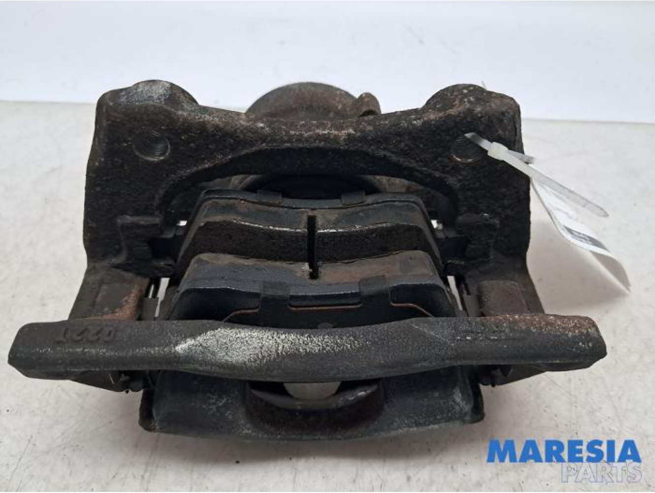 Renault - Clio - Front brake calliper, left