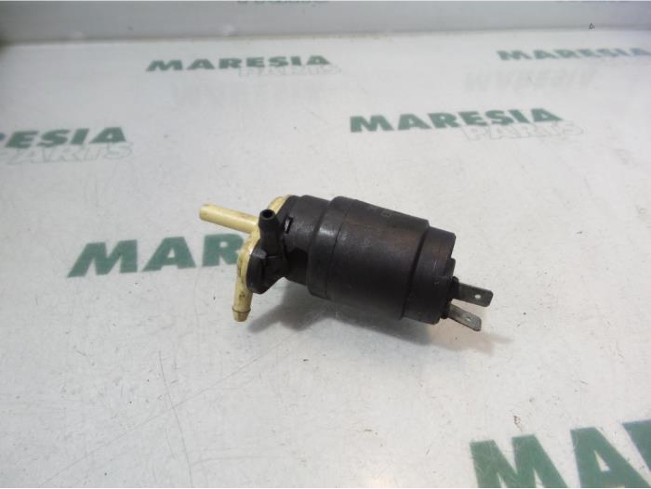 Fiat - Stilo - Scheibensprüherpumpe vorne