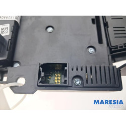 Opel - Astra - Radiobedienings paneel