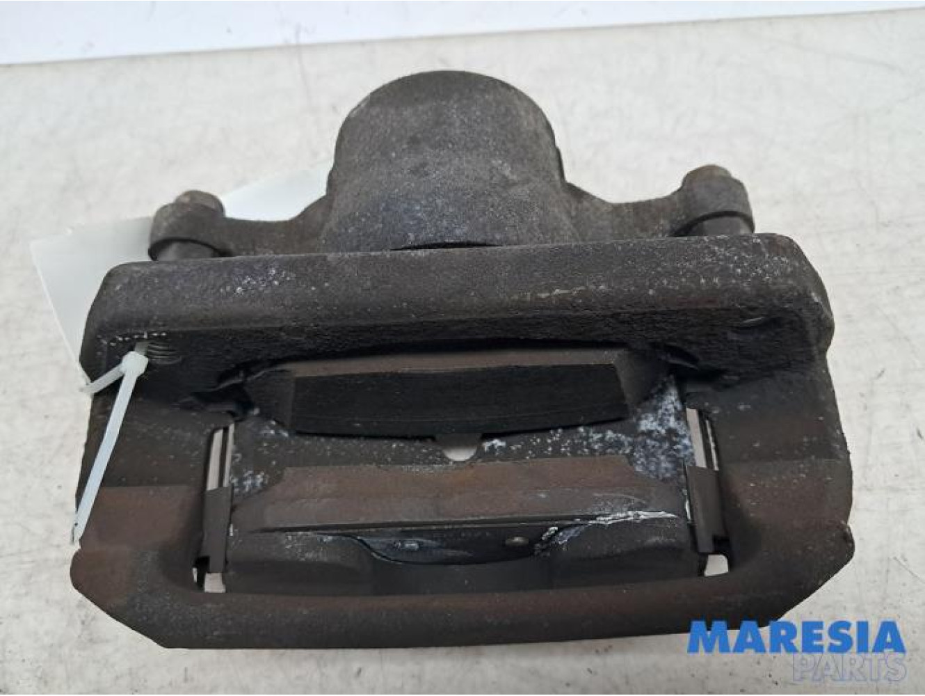 Opel - Karl - Front brake calliper, left