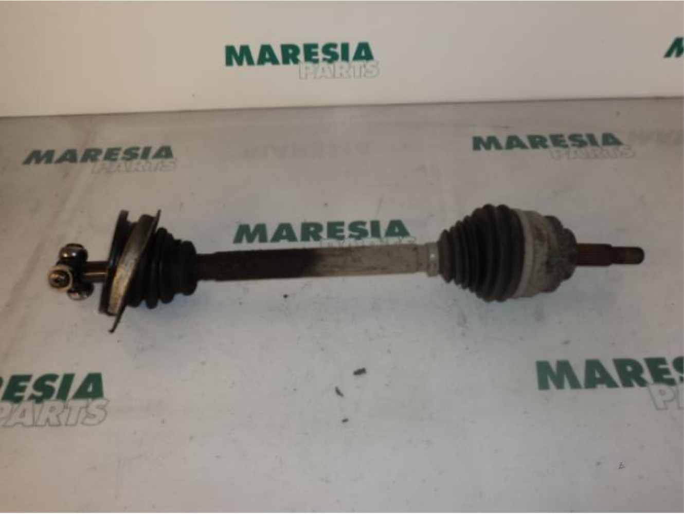 Renault - Megane - Aandrijfas links-voor