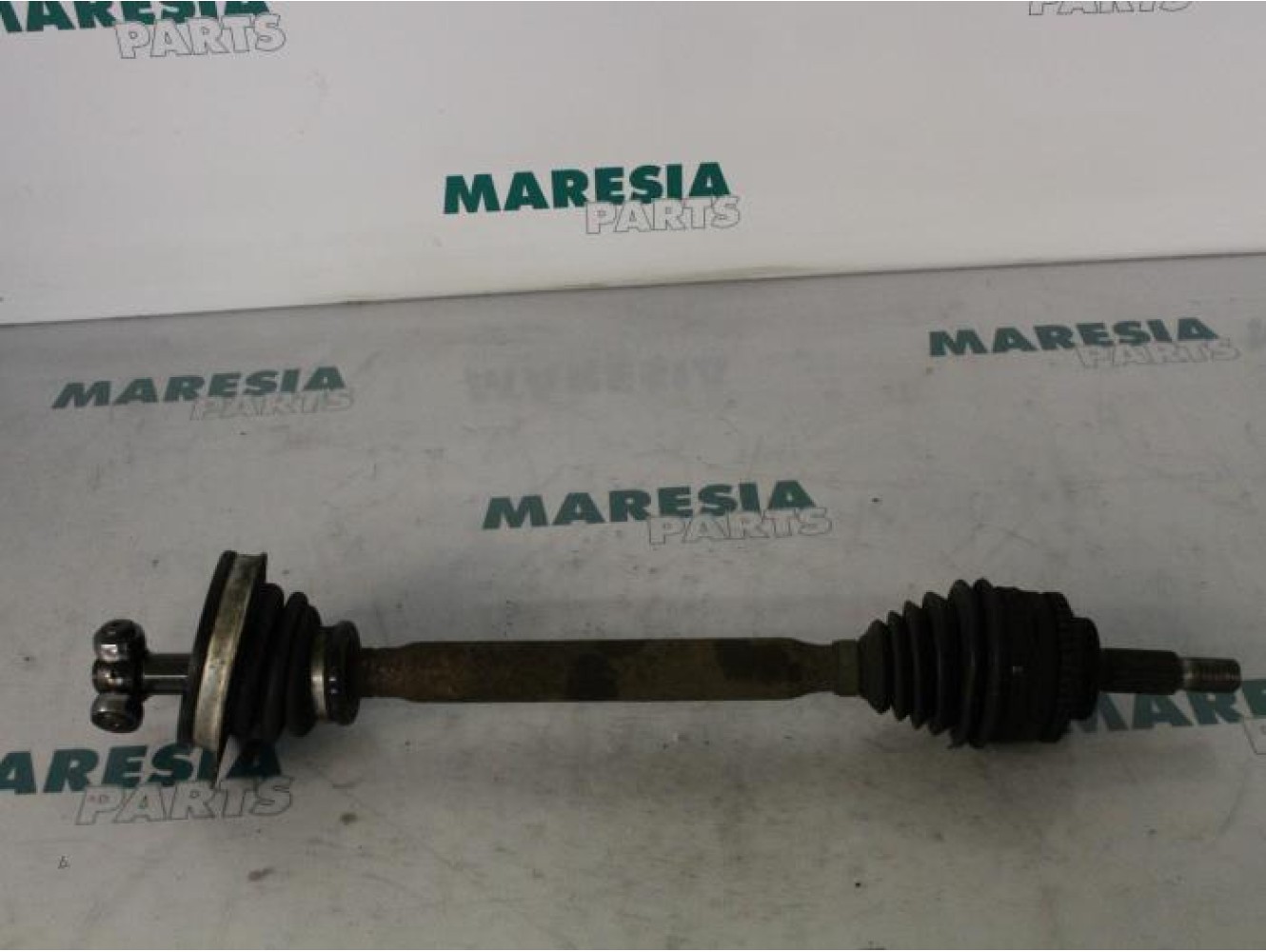 Renault - Megane Scenic - Aandrijfas links-voor