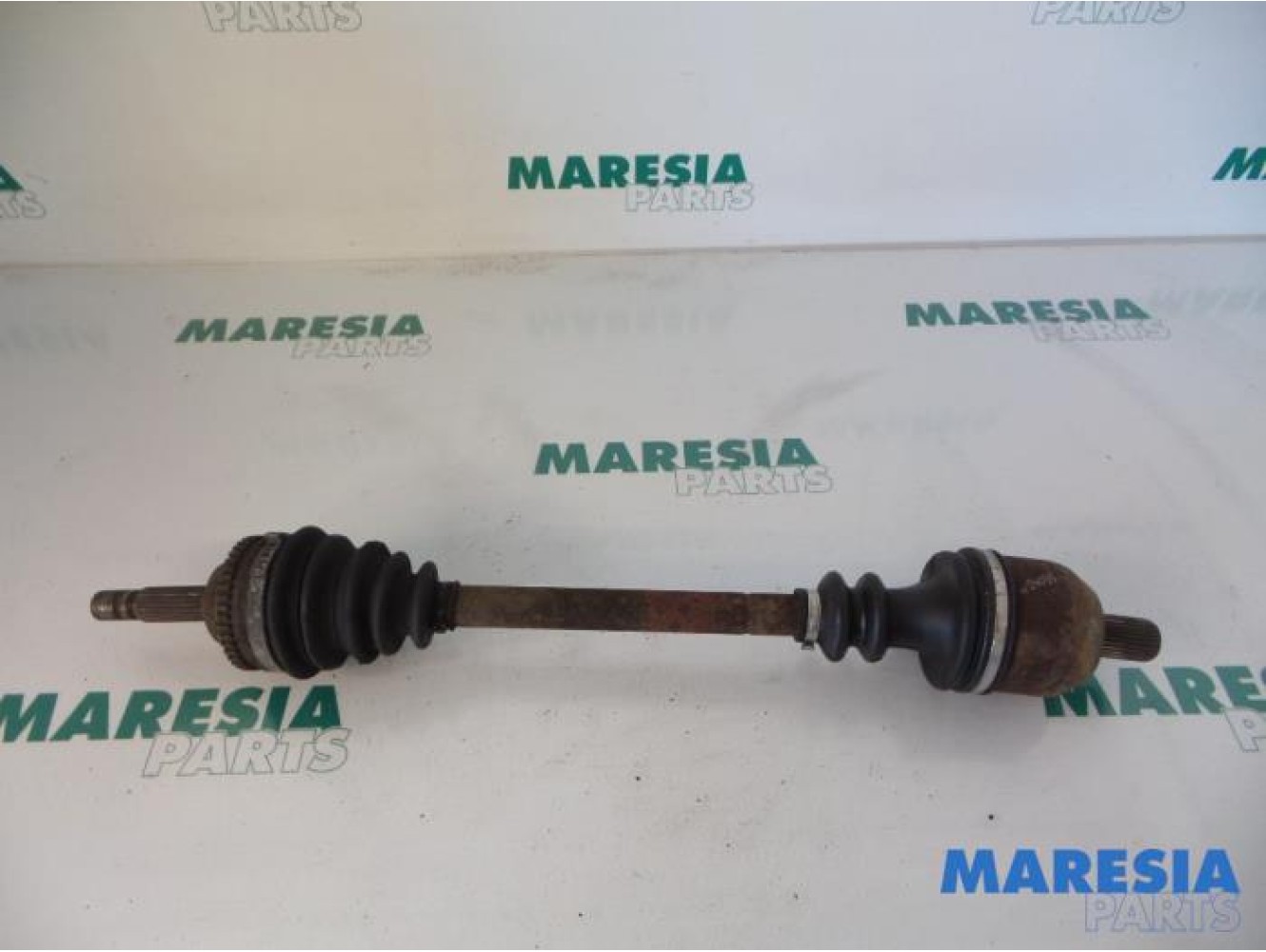 Renault - Megane - Aandrijfas links-voor