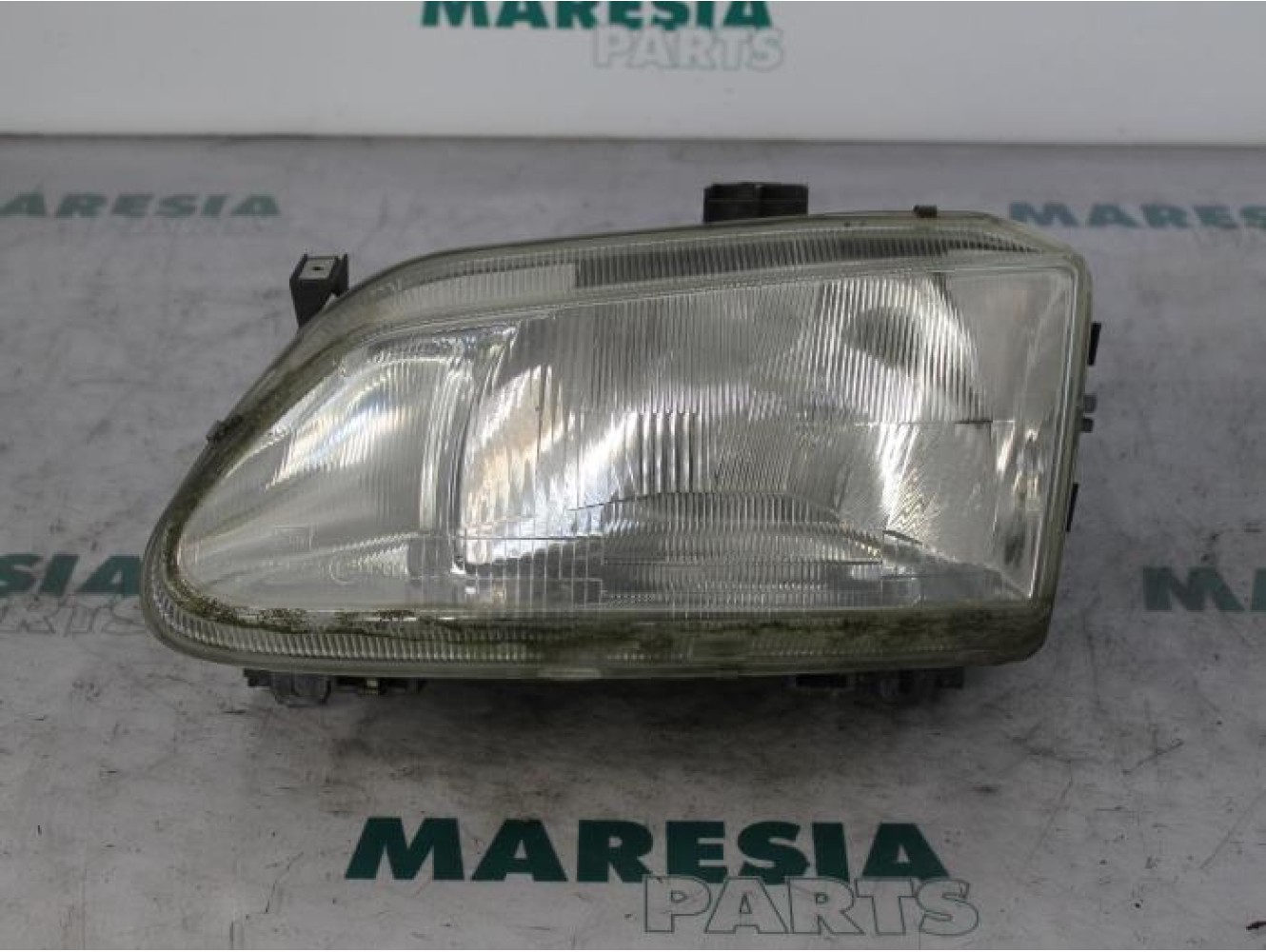Renault - Megane Scenic - Koplamp links