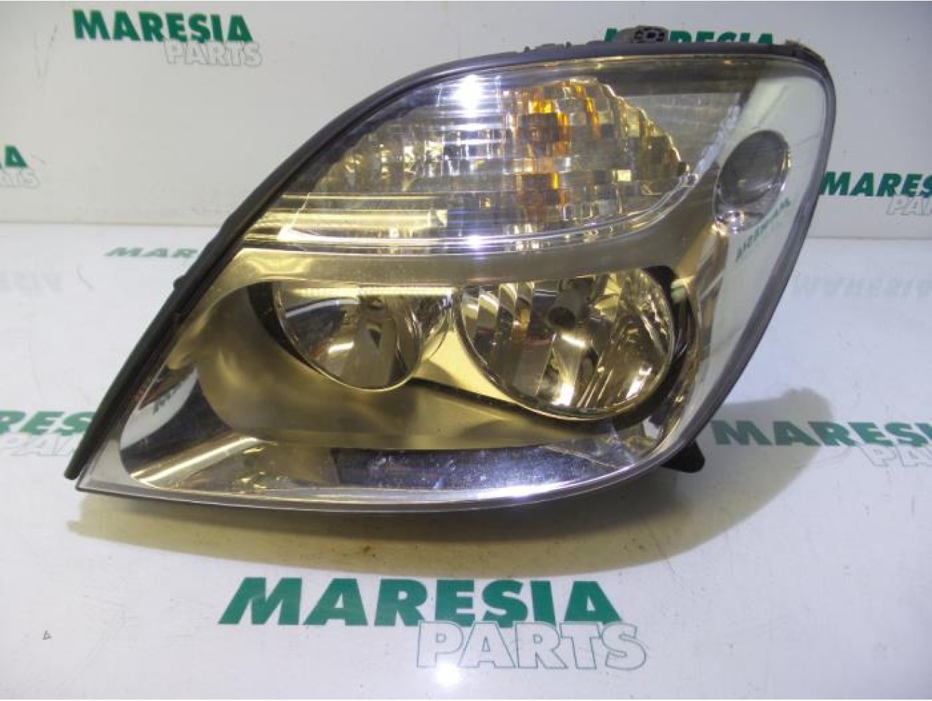 Renault - Megane Scenic - Koplamp links