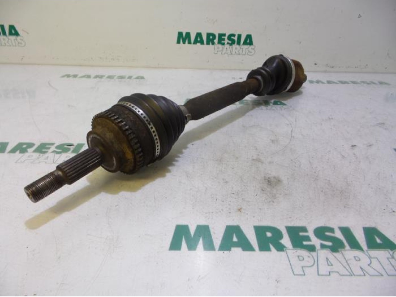 Renault - Megane Scenic - Aandrijfas links-voor