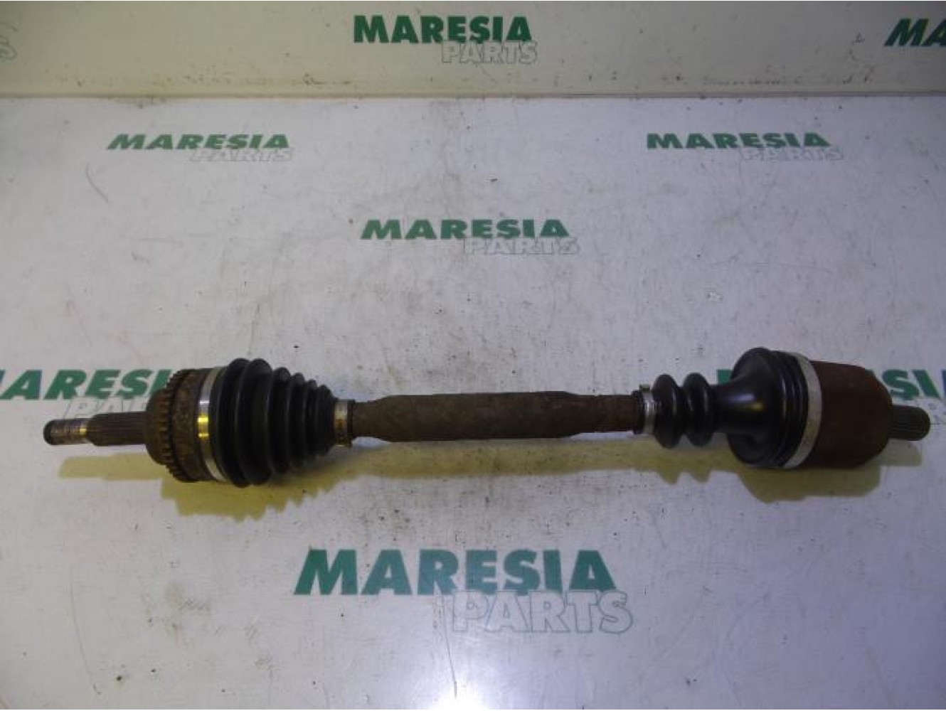 Renault - Megane Scenic - Aandrijfas links-voor