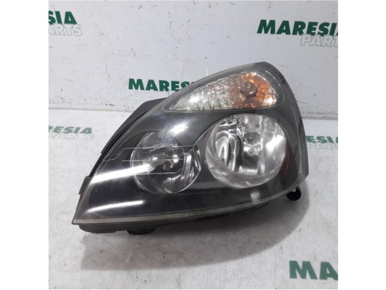 Renault - Clio - Koplamp links